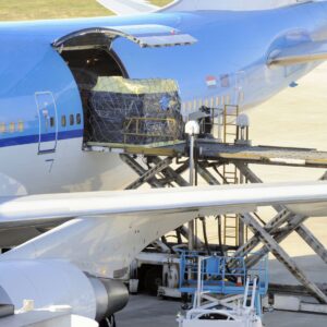 Image of a plane being loaded with cargo