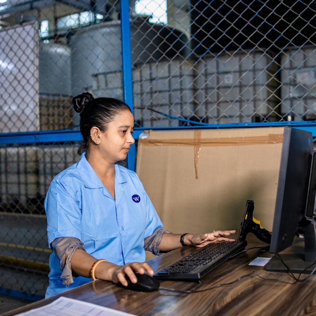 warehouse worker on a computer